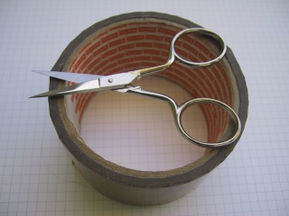 Scissors and insulating tape